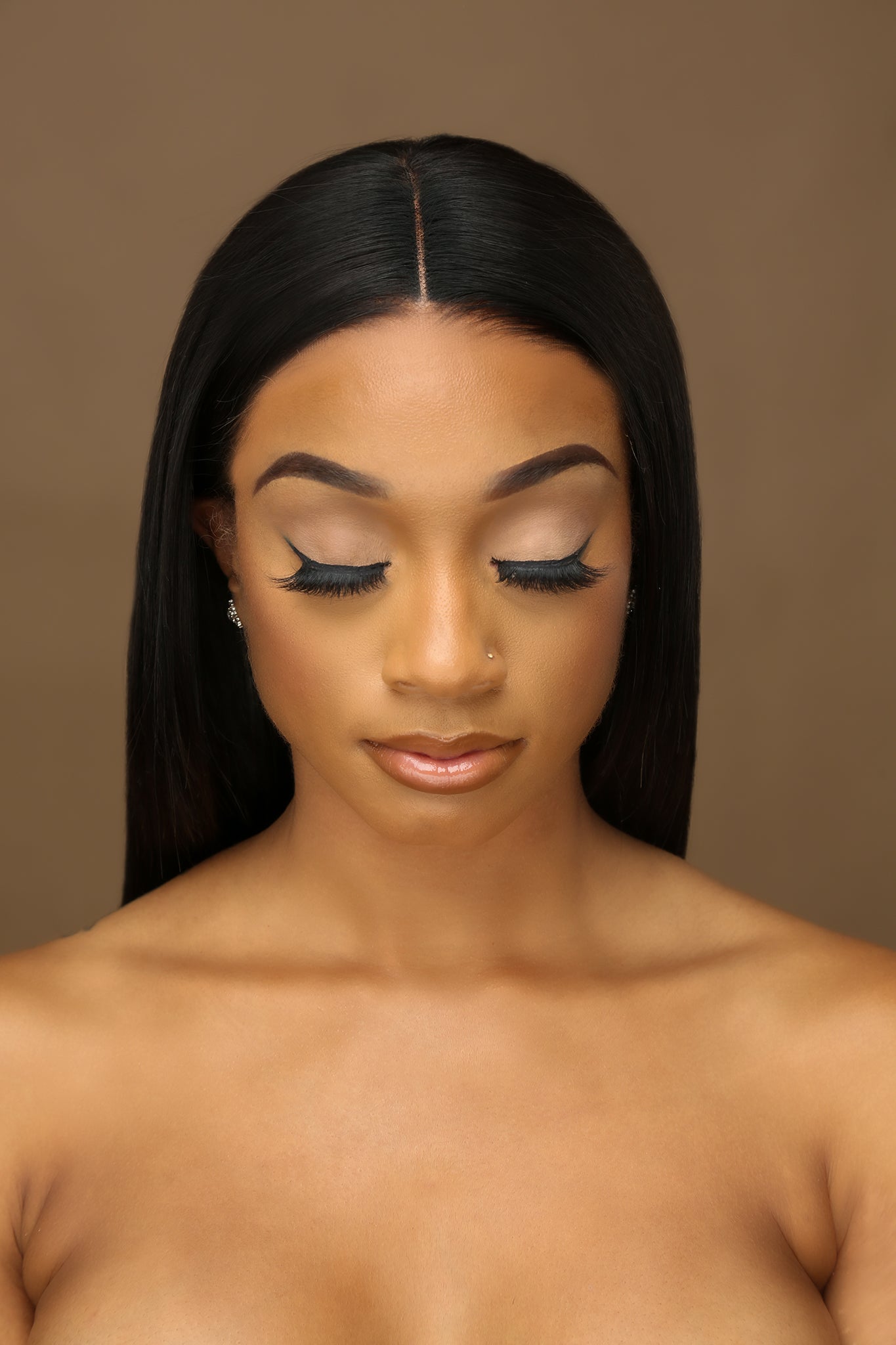 Front-view close-up of Tobago Love 3D mink lashes on model, soft wispy full volume false eyelashes for day-to-night looks