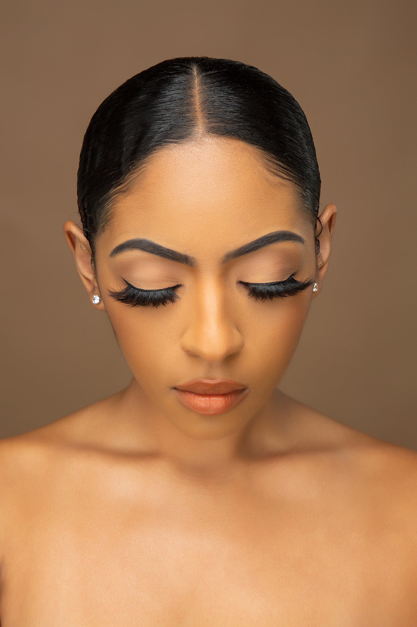 Front-view close-up of Carnival Diva 3D mink lashes on model, bold fluffy crisscross volume for vibrant festival-ready makeup.